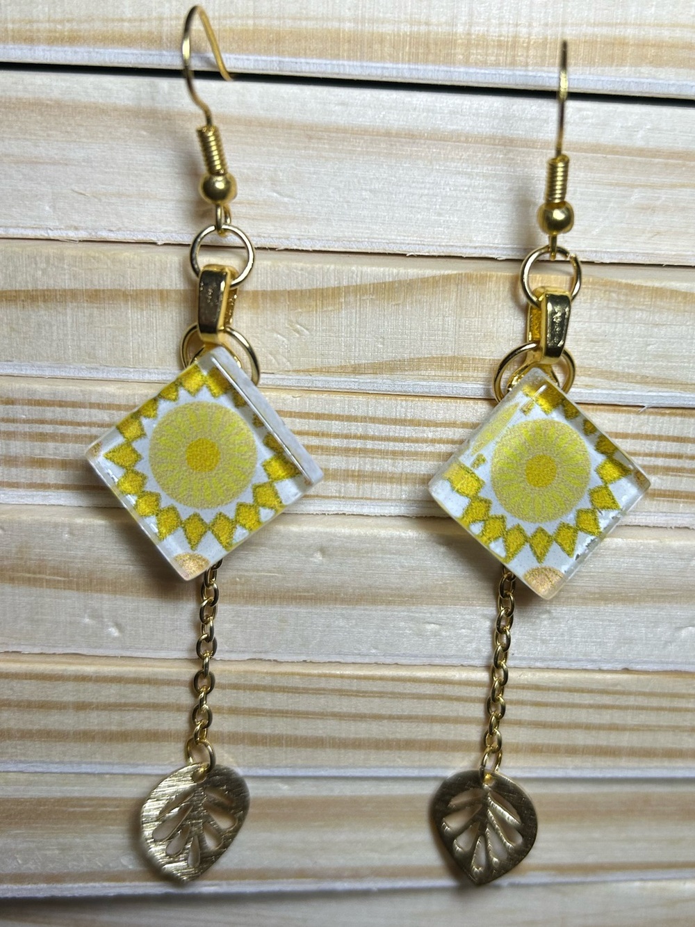 3/$25 Yellow Sunburst Drop Earrings with Gold Leaf Accent